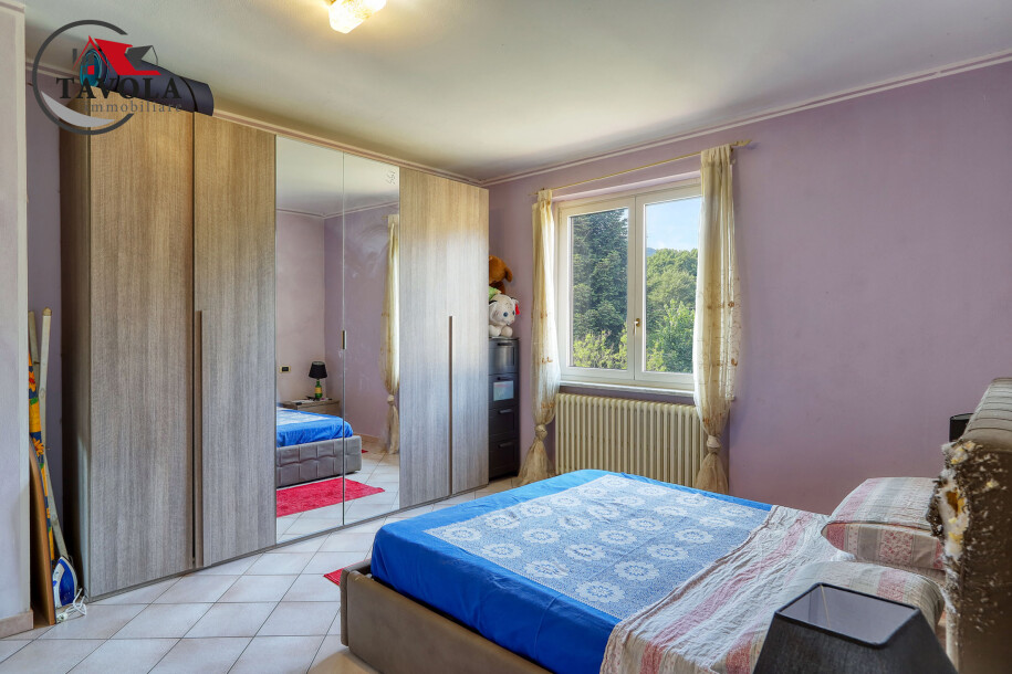 APPARTAMENTO TRILOCALE CON POSTI AUTO E GIARDINO-11